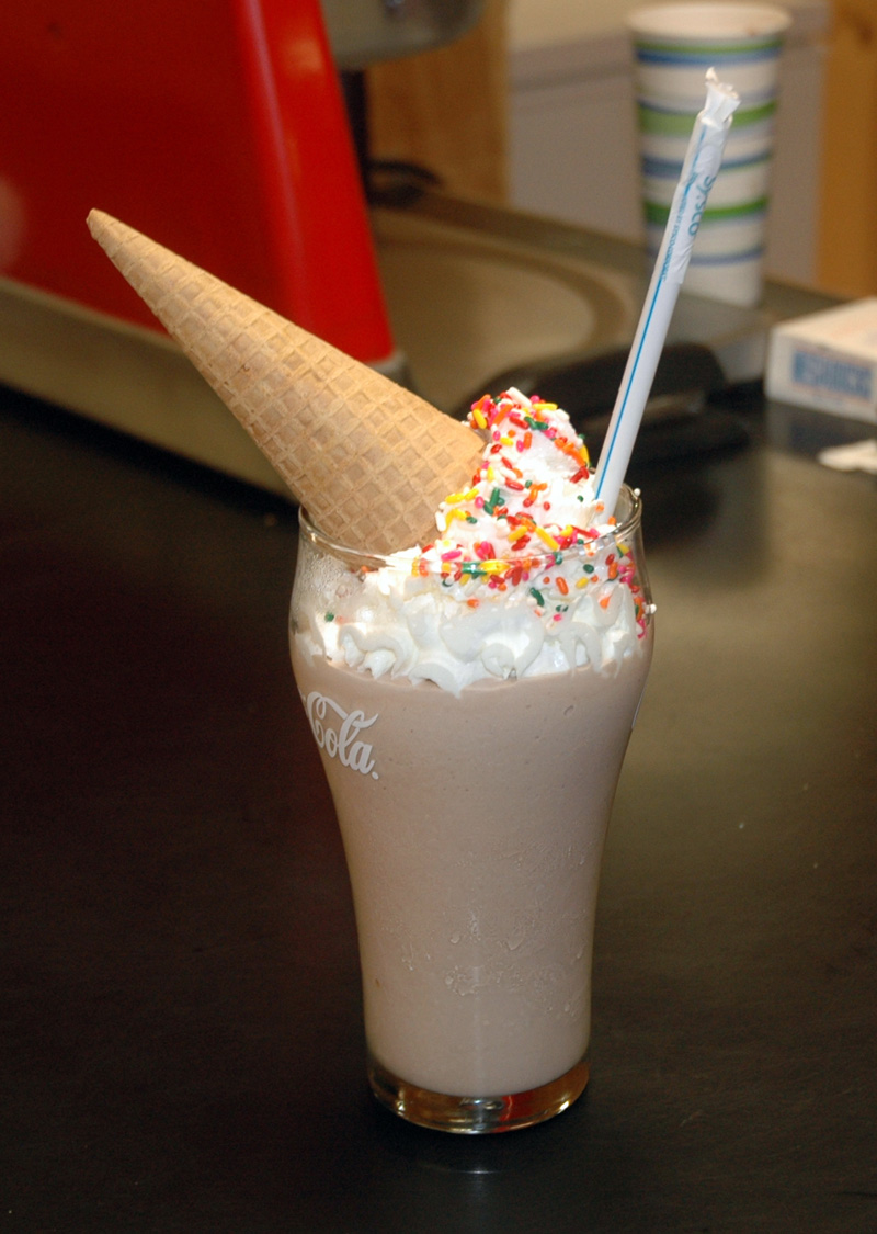 A chocolate milkshake with whipped cream and an ice cream cone at Crazy Burgers and Pizza. (Alexander Violo photo)