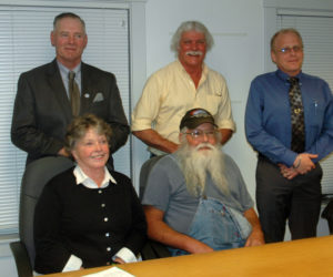 The five candidates for two seats on the Waldoboro Board of Selectmen. Standing from left: Clinton Collamore, Seth Hall, and Jeremey Miller. Sitting from left: Jann Minzy and Melvin Williams. (Alexander Violo photo)