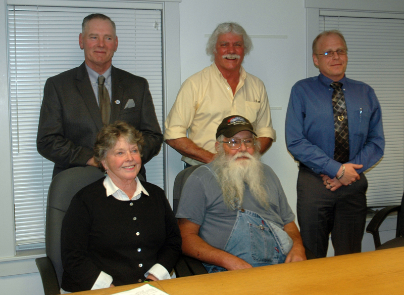 The five candidates for two seats on the Waldoboro Board of Selectmen. Standing from left: Clinton Collamore, Seth Hall, and Jeremey Miller. Sitting from left: Jann Minzy and Melvin Williams. (Alexander Violo photo)