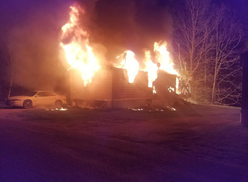 A mobile home at Brookside Mobile Home Park in Waldboro was fully involved when emergency responders arrived on scene shortly after midnight on Saturday, May 20. (photo courtesy Waldboro Police Department)