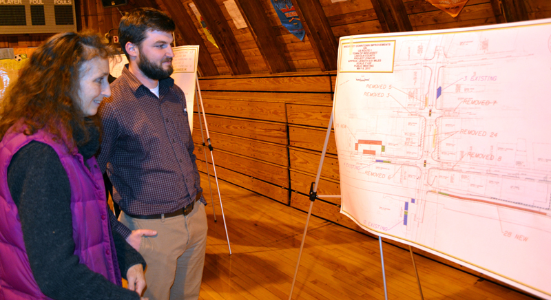 Wiscasset resident Susan Robson reviews a diagram of the parking proposal for the Wiscasset downtown traffic project with Steve Bates, of VHB, during a public hearing Monday, May 8. (Abigail Adams photo)