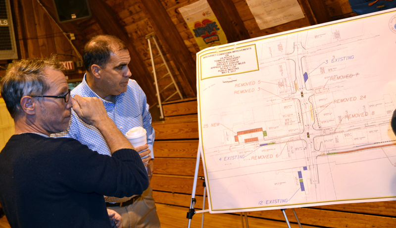 Wiscasset downtown business owner Jay McNamara (left) reviews a diagram of the dowtown parking proposal with Maine Department of Transportation Project Manager Ernie Martin on Monday, May 8. (Abigail Adams photo)