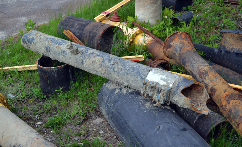 A section of water pipe more more than a century old, replaced as part of the Wiscasset Water District's infrastructure improvement project, outside the district's office Tuesday, May 23. (Abigail Adams photo)