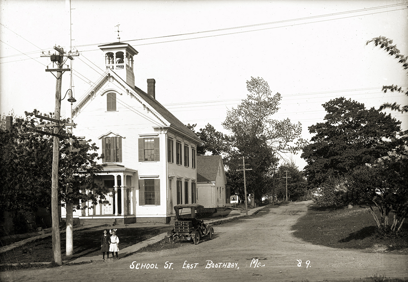 A postcard depicting School Street, East Boothbay, on display at the "Lincoln County Through Eastern's Eye" exhibit at Boothbay Railway Village.