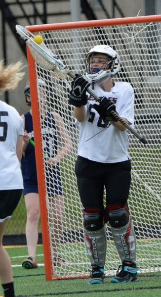 Lincoln Academy senior Emily Huber makes a save in net against Boothbay. (Paula Roberts photo)