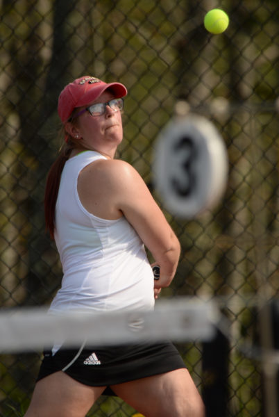 Polina Scimone prepares to return a shot in her 6-0, 6-0 win at third singles. (Paula Roberts photo)