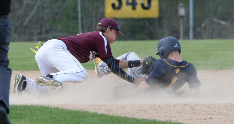 Brent Stewart is tagged out by Nokomis shortstop Josh Smestad while trying to stretch a single.  (Paula Roberts photo)