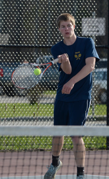 Kyle Donlin returns a shot in Medomak Valley boys tennis action on May 3. (Paula Roberts photo)