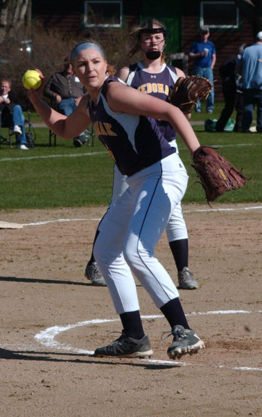 Medomak Valley pitcher Gabby DePatsy throws the ball to first to pick up the out. DePatsy pitched a perfect game on May 3 in the Lady Panthers 15-0 win over MCI. (Carrie Reynolds photo)