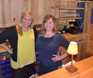 Taylor Corson and Cerina Leeman behind the bar of The Harbor Room in New Harbor on Monday, June 19. The longtime friends plan to reopen the restaurant in mid-July. (Maia Zewert photo)