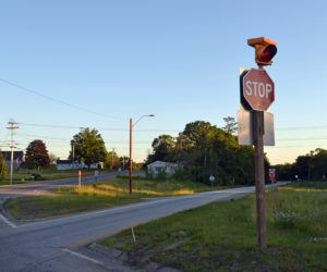 A flashing red light atop the stop sign at the intersection of Route 1 and Main Street in Damariscotta fulfills the first recommendation of a committee that reviewed the safety of two Route 1 intersections. (Maia Zewert photo)