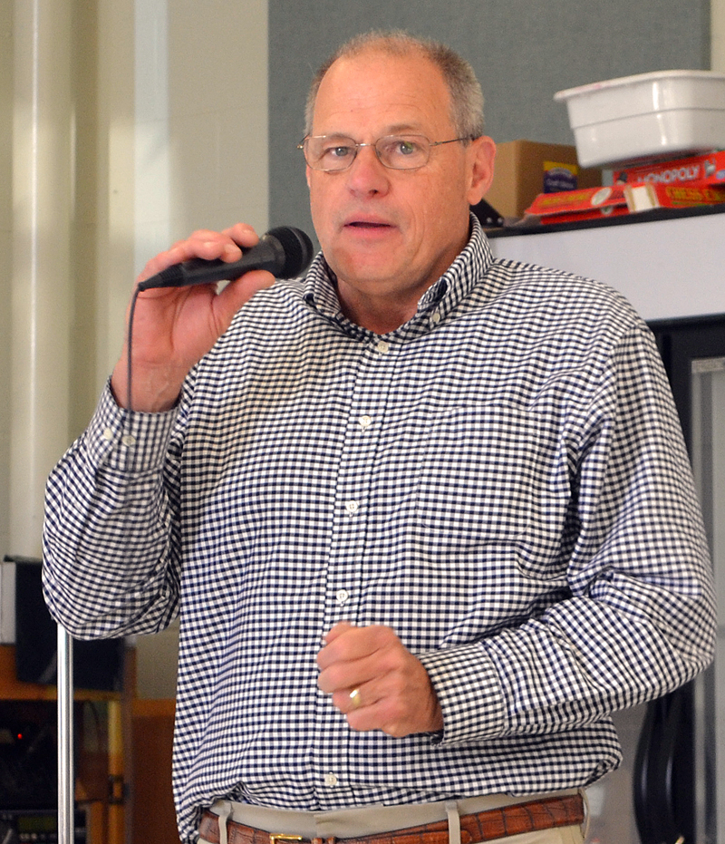 Damariscotta Town Manager Matt Lutkus welcomes attendees of the annual town meeting Wednesday, June 14. (Maia Zewert photo)