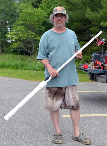 Bill Clark holds one of the many tools the Lincoln County Amateur Radio Club used to set up for American Radio Relay Field Day. The club uses the tool to place antennas into high places, such as trees, to allow for the best connection possible. (Remy Segovia photo)