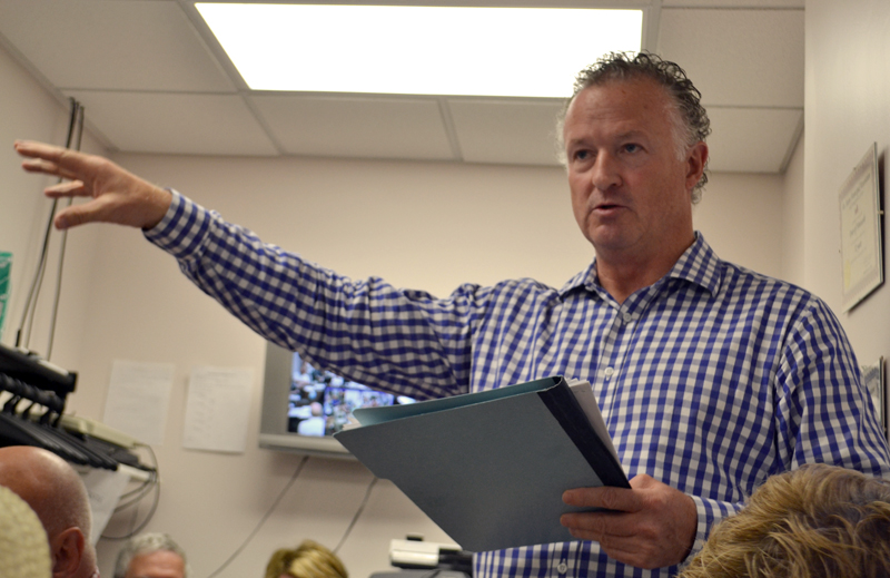 Jack Freker, one of the members of The Standard of Newcastle Condominium Association, talks about Kieve-Wavus Education Inc.'s plans to purchase the boathouse behind the condominium building during the Newcastle Board of Selectmen's meeting Monday, June 12. (Maia Zewert photo)