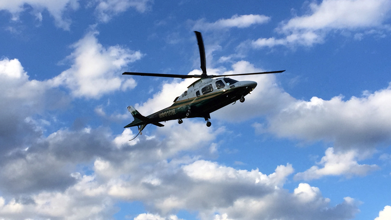 A LifeFlight helicopter prepares to land on the Lincoln Academy track field Tuesday, June 20 for a training exercise with Lincoln County firefighters. (Maia Zewert photo)