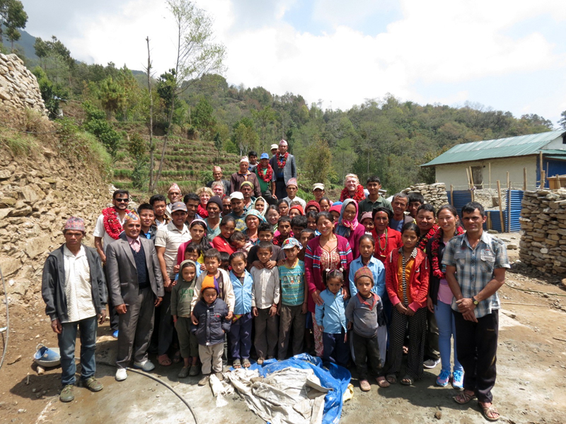 Mexicali Blues founders Pete and Kim Erskine stand among the villagers of Rok, Solukhumbu, Nepal during a recent visit to the country. (Photo courtesy Pete and Kim Erskine)