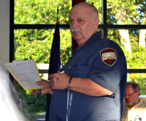 Newcastle Fire Chief Clayton Huntley fields questions about the fire department budget at annual town meeting Wednesday, June 14. (Abigail Adams photo)