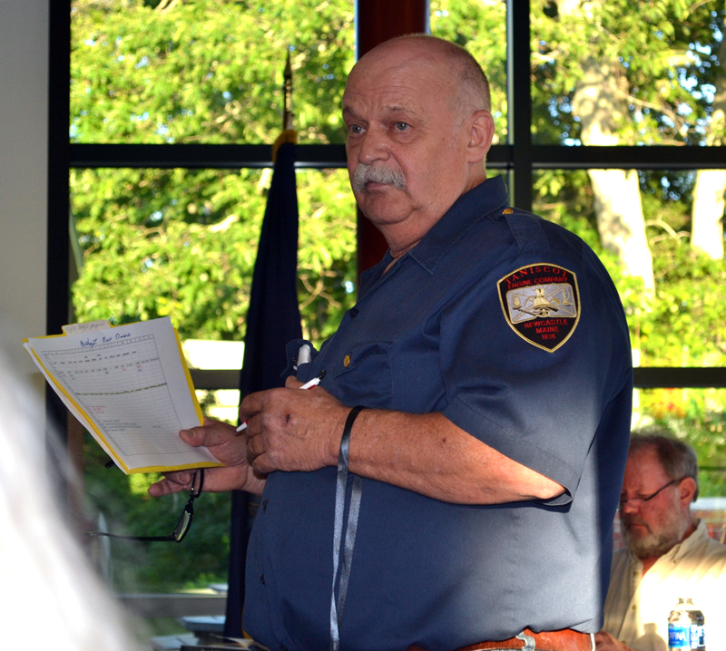 Newcastle Fire Chief Clayton Huntley fields questions about the fire department budget at annual town meeting Wednesday, June 14. (Abigail Adams photo)