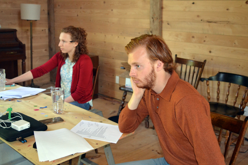 Aris Company's Gracey Falk and Chris Holtkamp pay close attention as they direct a scene from Falk's play "Adam and Carol" in preparation for the theater company's June 8 evening of new plays at the beautifully restored Aris Farm barn in Walpole. (Christine LaPado-Breglia photo)