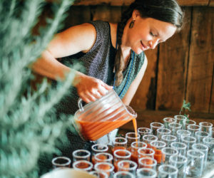 Christa Thorpe pours refreshments for Harvest Moon Catering. (Photo courtesy Jamie Mercurio Photography)