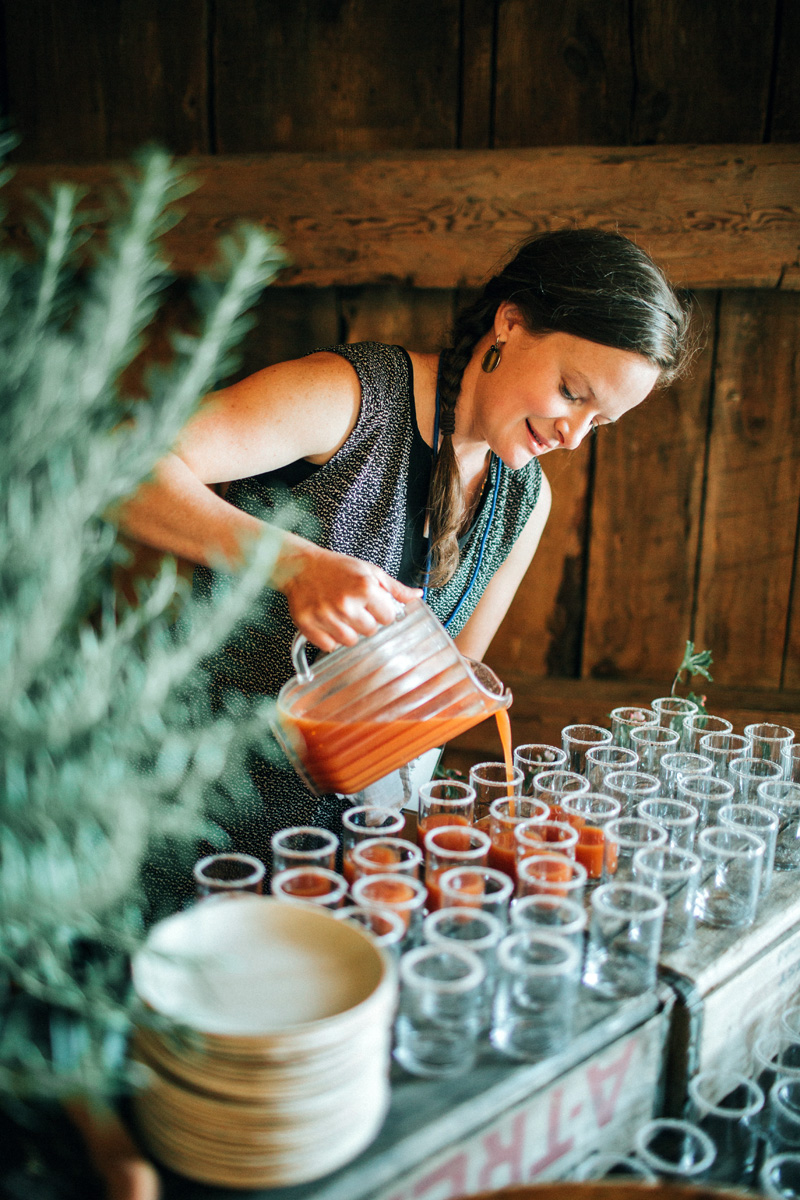 Christa Thorpe pours refreshments for Harvest Moon Catering. (Photo courtesy Jamie Mercurio Photography)