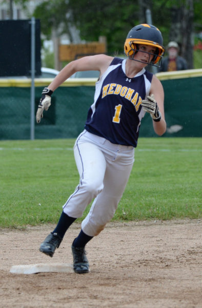 Josie Jameson rounds second base and head to third for a triple. (Paula Roberts photo)