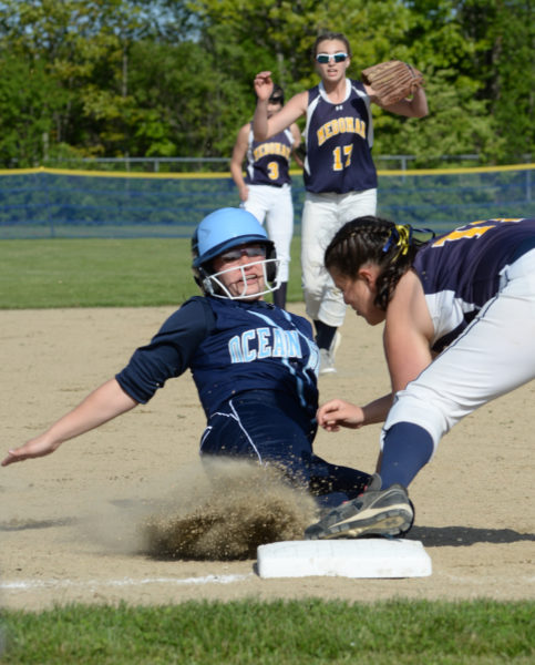 Lady Panther Hallie Kunesh tags out Mariner Lauren Hatch at third. (Paula Roberts photo)