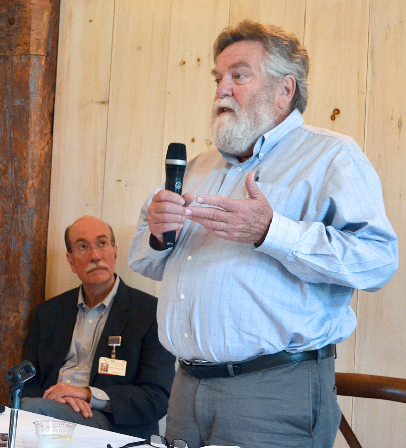 LincolnHealth Chief Medical Officer Dr. Russ Mack answers a question as LincolnHealth President and CEO Jim Donovan looks on during a meeting about the MaineHealth unification proposal Wednesday, July 12. (Maia Zewert photo)