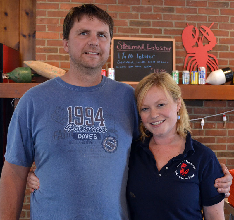 Joe Lane Lobsterman co-owners Joe Lane and Izzy Nelson behind the counter of their restaurant Friday, July 7. The restaurant opened at 115 Elm St. in Damariscotta at the end of June. (Maia Zewert photo)