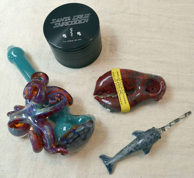 Some of the pipes and accessories available at Sea Smoke Shop in downtown Damariscotta. South Bristol native Penn Way, now of Damariscotta, owns the business. (Maia Zewert photo)