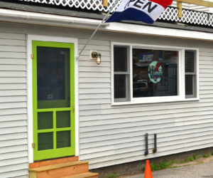 The entrance to Sea Smoke Shop at the side of 95 Main St. in downtown Damariscotta, next to the Colby & Gale Inc. service station. (Maia Zewert photo)