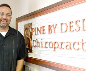 Dr. Thomas White in the Spine by Design office at 19 Sheepscot Road in Newcastle on opening day, Friday, July 14. (Maia Zewert photo)