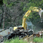 Reed Mansion Cleanup Underway, Owner Reveals Plans