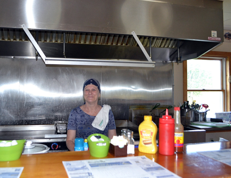 Hunters Breakfast cook Cindy Allen will man the grill for the last time Saturday, July 7, when the restaurant will close its doors after more than 10 years. (Charlotte Boynton photo)