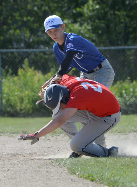 Chase Crockett tags out Henry Burnham on a throw down to second from Midcoast 15 catcher Joseph Giberson. (Paula Roberts photo)