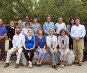 The 2017 Lincoln Academy Board of Trustees. Front from left: Dennis Prior, Faustine Reny, Karen Moran, Lisa Masters, and Chrissie Wajer. Back: Jon McKane, Betty Allen, Bill Morgner, Sarah Maurer, Pam Gormley, Hugh Riddleberger, Stephen Dixon, Judi Hilton, Head of School David Sturdevant, and Chris Olson. Not pictured: new board member Paul Anderson.