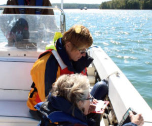 Damariscotta River Association volunteers (from left) J.B. Smith, Gisela Heimsath-Rhodes, and Tam Green gather water quality information aboard the Wendy J. (Photo courtesy Hannah McGhee)