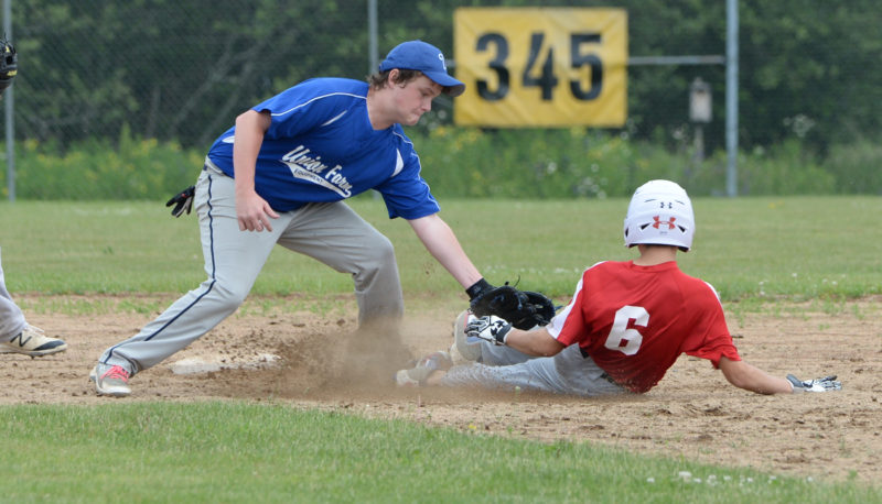 Levi Farrin is tagged out as second by Union Farm's Jonah Miller. (Paula Roberts photo)