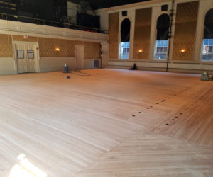 The Lincoln Theater floor after sanding. The refinished floor will make its debut when the theater reopens Friday, Sept. 8. (Photo courtesy Andrew Fenniman)