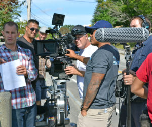 Bobby Davison (left) and his camera crew shoot on the Damariscotta-Newcastle bridge the morning of Friday, Aug. 25. (Christine LaPado-Breglia photo)