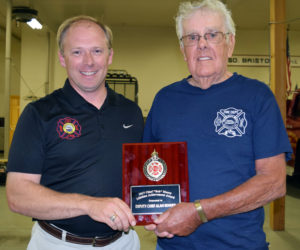 Waldoboro Fire Chief Paul Smeltzer (left) presents the Chief Bob Maxcy Lifetime Achievement Award to former Waldoboro Deputy Fire Chief Allan Benner. (J.W. Oliver photo)