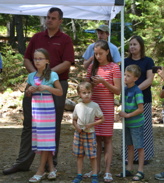 David Seavey, with his wife and six children, traveled from Michigan to represent the Segerstrom family at the ribbon-cutting ceremony for the Carl and Barbara Segerstrom Preserve at Squam Creek. (Charlotte Boynton photo)