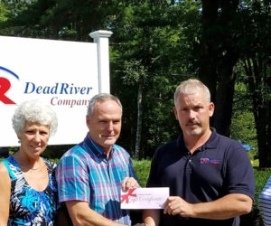 From left: Lincoln County Fire Chiefs Association Treasurer Lynn Martin and board member Mike Martin accept a $1,000 gift certificate from Dead River Co. Market Manager Fred Woodbury as association secretary and Dead River employee Leah Puckey looks on. (Photo courtesy Lynn Martin)