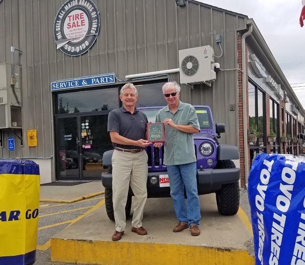 Newcastle Chrysler President Randy Miller (left) stands with Bristol Area Lions Club President Brendan Donegan. Newcastle Chrysler is offering a 2017 Jeep Cherokee as the prize for a hole-in-one on the third hole in the Bristol Area Lions Golf Tournament.