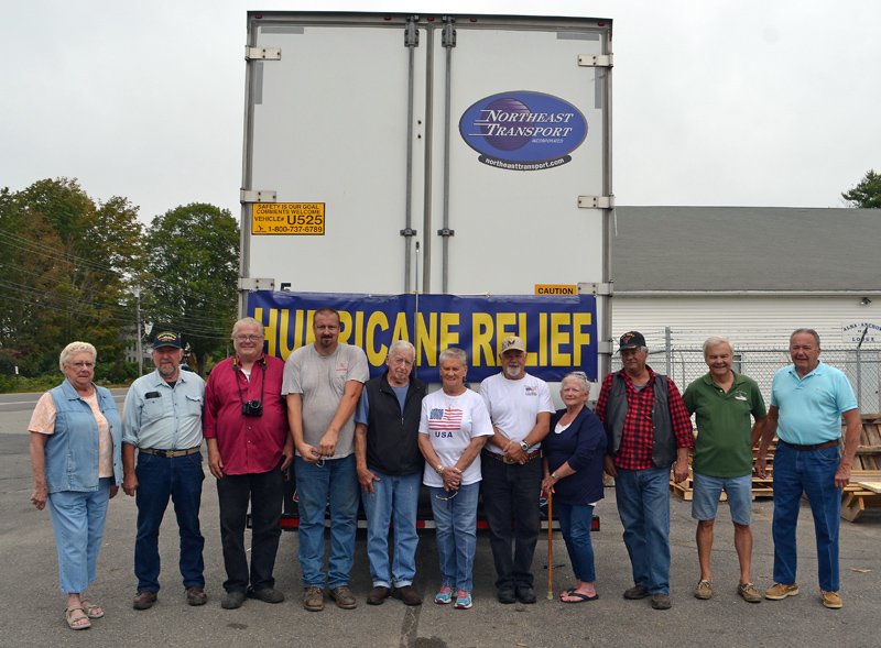 The American Legion and American Legion Auxiliary in Damariscotta worked with two local trucking companies to collect a trailer full of supplies for hurricane relief. From left: Jane Toussaint, Robert Sewall, Jim Boutilier, Woodbury McLean, Bob Wilshire, Bonnie Poland, Bruce Poland, Gayle Gifford, Gerry Gifford, Larry Sidelinger, and Ron Toussiant. (Maia Zewert photo)