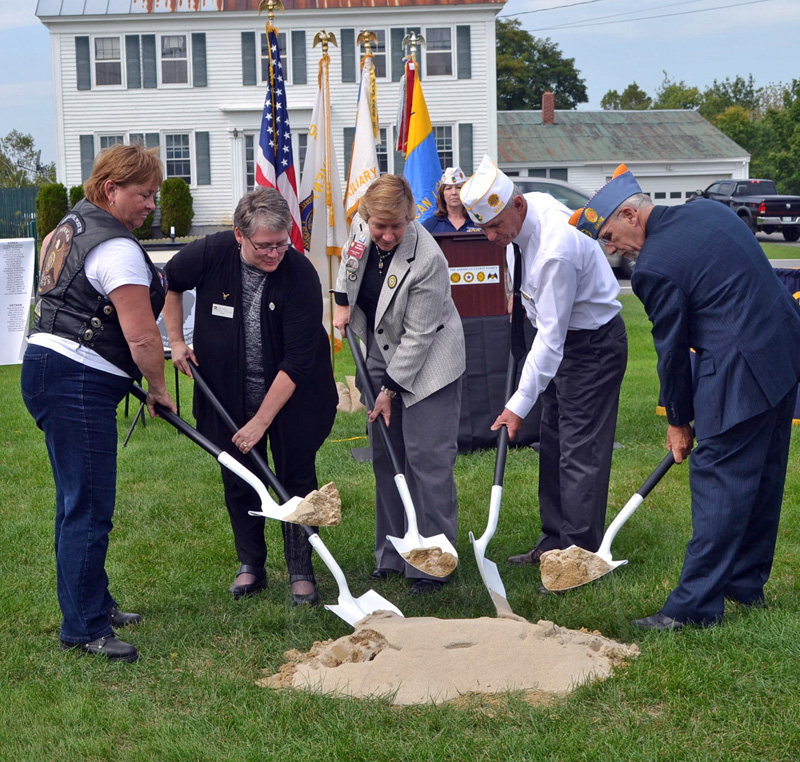 American Legion leaders break ground for the POW/MIA memorial at state headquarters in Winslow on Friday, Sept. 15. From left: American Legion Riders State Director Kaye Bouchard, state American Legion Auxiliary Department of Maine President Ann Durost, American Legion Auxiliary National President Diane Duscheck, and Sons of the American Legion National Executive Committeeman David Raymond. (Charlotte Boynton photo)