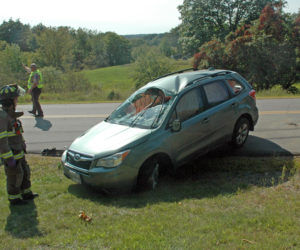 The Lincoln County Sheriff's Office and the Nobleboro Fire Department respond to a single-vehicle rollover on East Pond Road the afternoon of Tuesday, Sept. 12. (Alexander Violo photo)