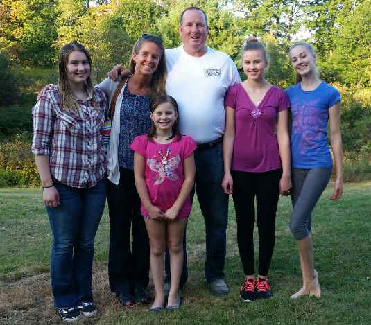 The Pagurko family gathers Saturday, Sept. 23 to celebrate surviving a house fire earlier in the month. From left: Anna, Melanie, Christina, John, Calista, and Shae-Lynn. (Photo courtesy the Pagurko family)