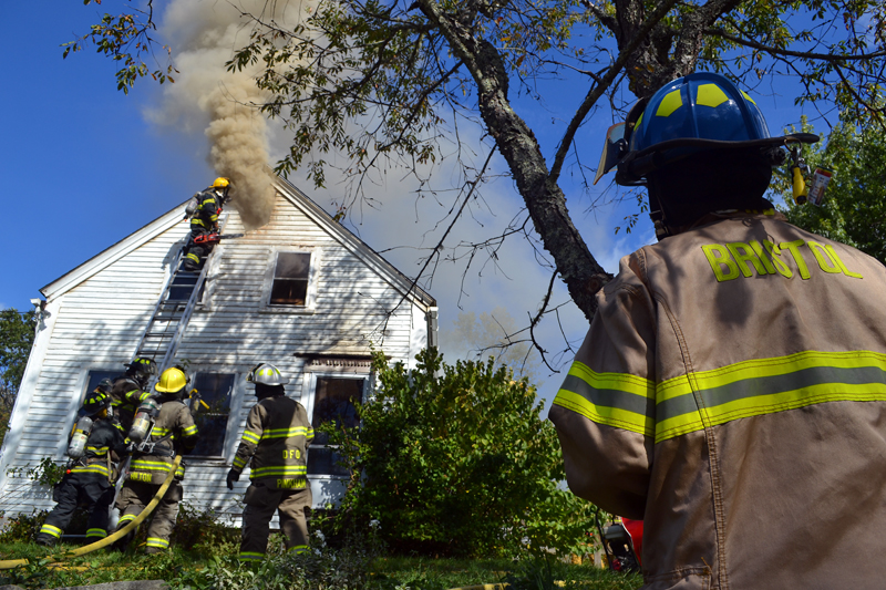 Firefighters work at 7 Redonnett Mill Road in Bristol Mills the morning of Tuesday, Oct. 3. (Maia Zewert photo)