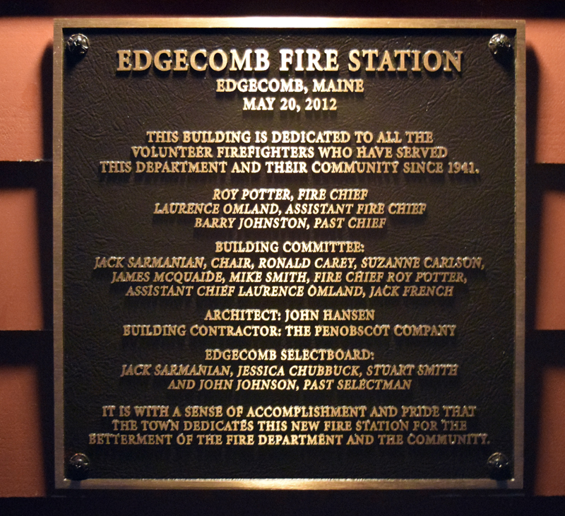 A new plaque at the Edgecomb fire station recognizes the many contributors to the building's construction. (J.W. Oliver photo)